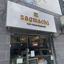 The Zagmachi sign above the shop door